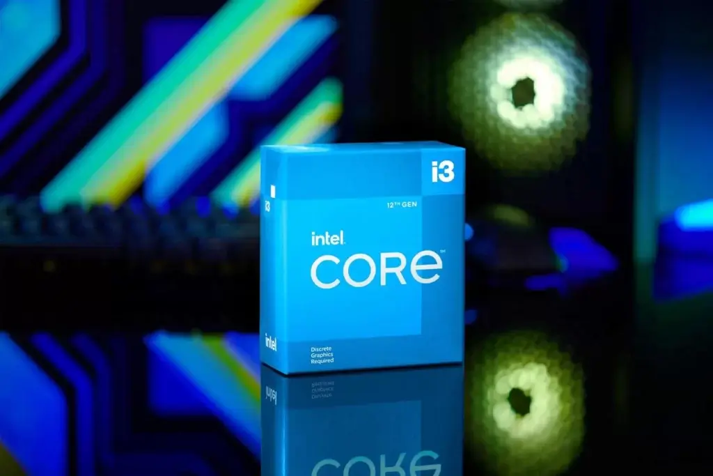 Processeur Intel Core i3-12100F entouré d'icônes de jeux vidéo et de composants informatiques